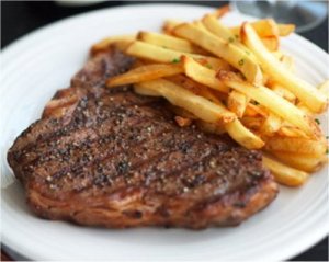 Whiskey Butter Steak with Truffle Fries.